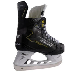Bauer Supreme M30 Hockey Skates - Intermediate (2024) -Hockeyvancouver Bauer Hockey Skates Bauer Supreme M30 Intermediate 2024 Black Yellow side back facing right