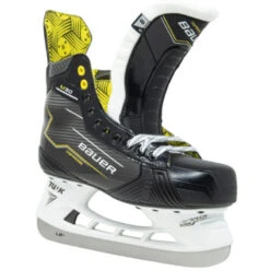 Bauer Supreme M30 Hockey Skates - Senior (2024) 11 Bauer Supreme M30 Hockey Skates - Senior (2024) -Hockeyvancouver Bauer Hockey Skates Bauer Supreme M30 Senior 2024 Black Yellow side front tongue pulled forward facing right
