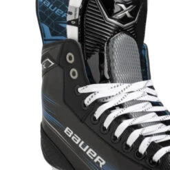 Bauer X Hockey Skates - Junior (2023) -Hockeyvancouver Bauer Hockey Skates Bauer X Junior 2023 Black Blue close up of tongue and laces facing right